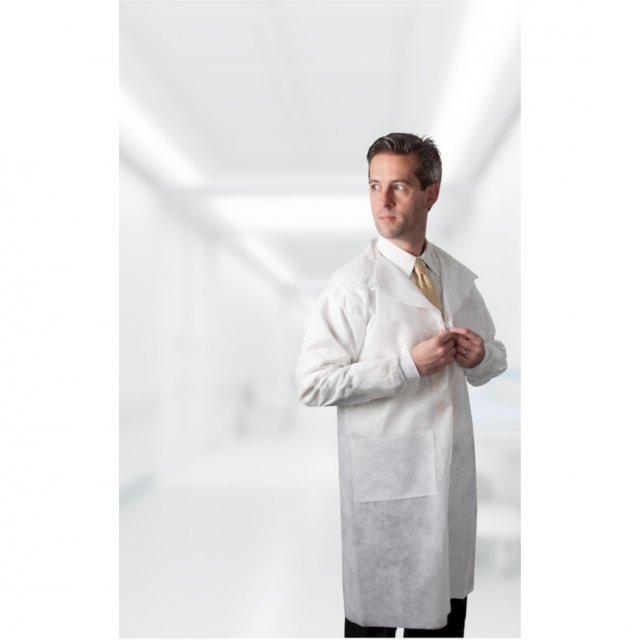 Tronex 5940 white spunbond lab coat worn by a model, blurred light corridor background (Tronex product image)